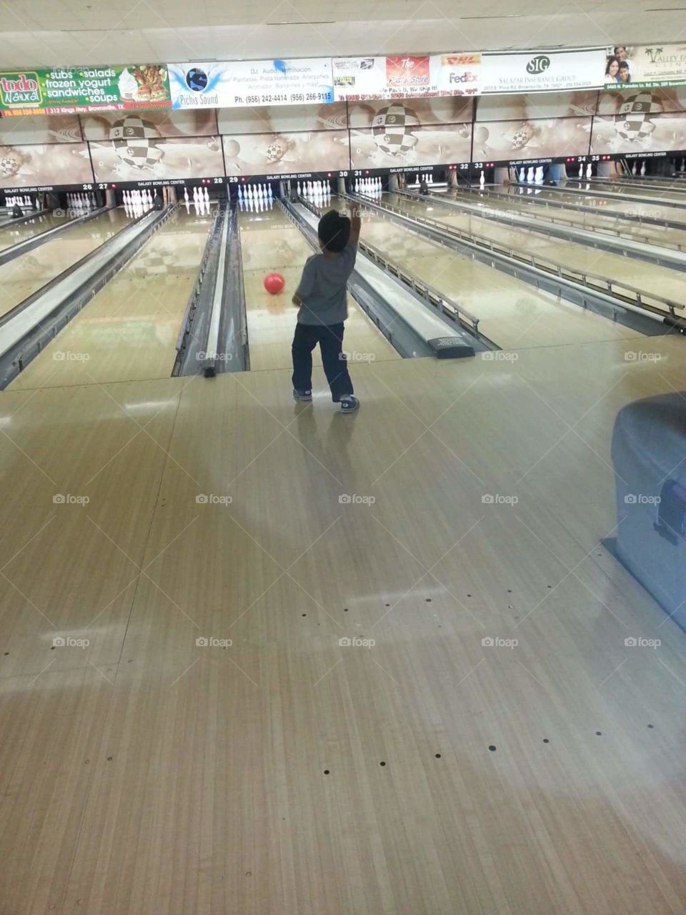 little boy bowling . my son bowling 
