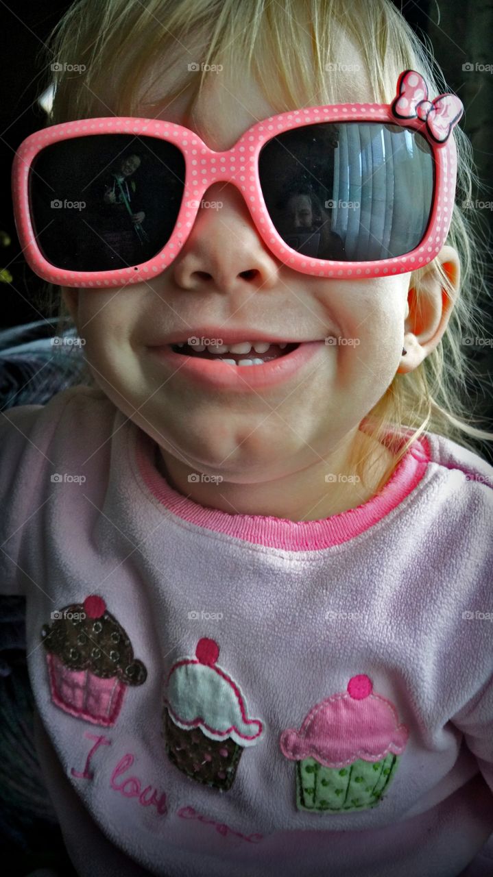 Cute girl wearing sunglasses