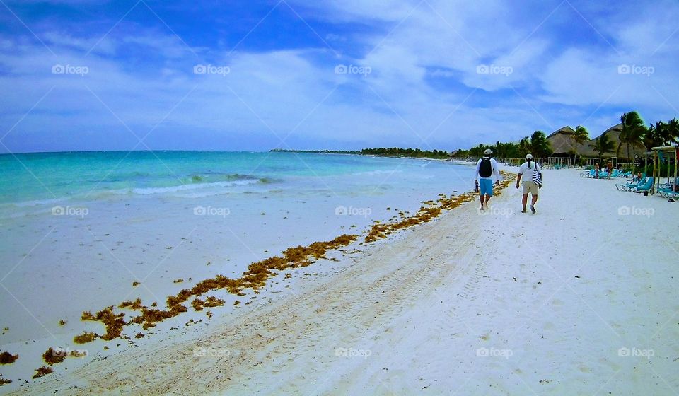 Colorful Beach in Akumal, Mexico for travel. Beautiful skies on a sunny day.