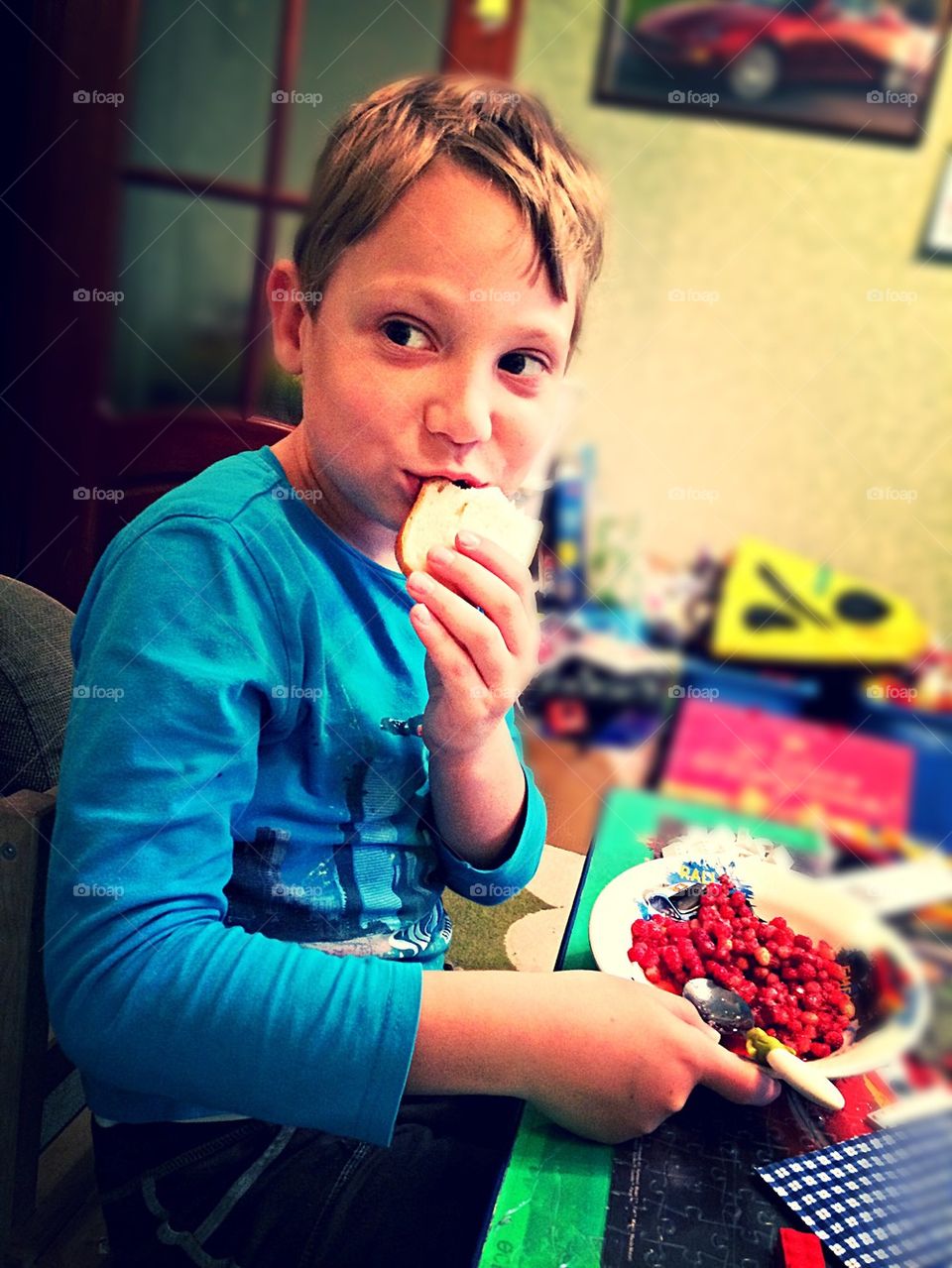 Boy eating berries