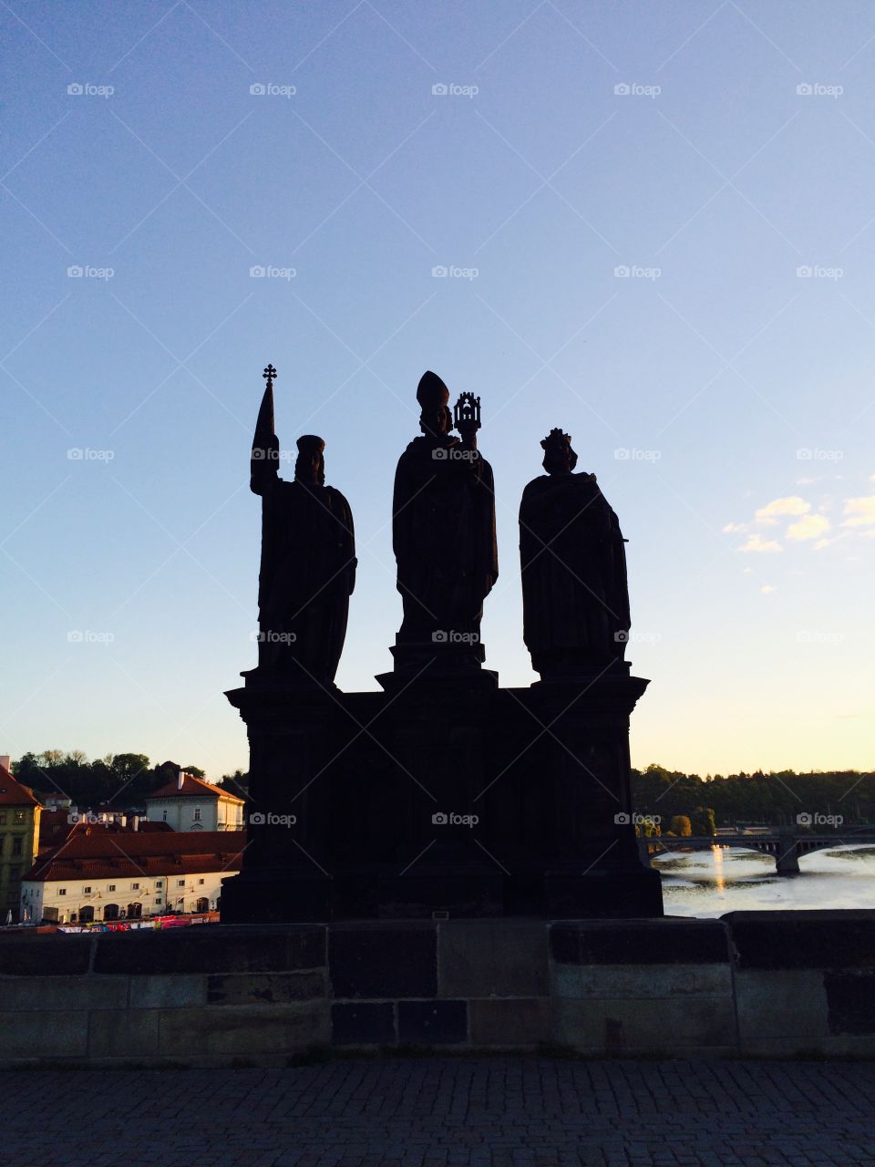 Silhouette of statues on Charles bridge in Prague, Czech Republic 