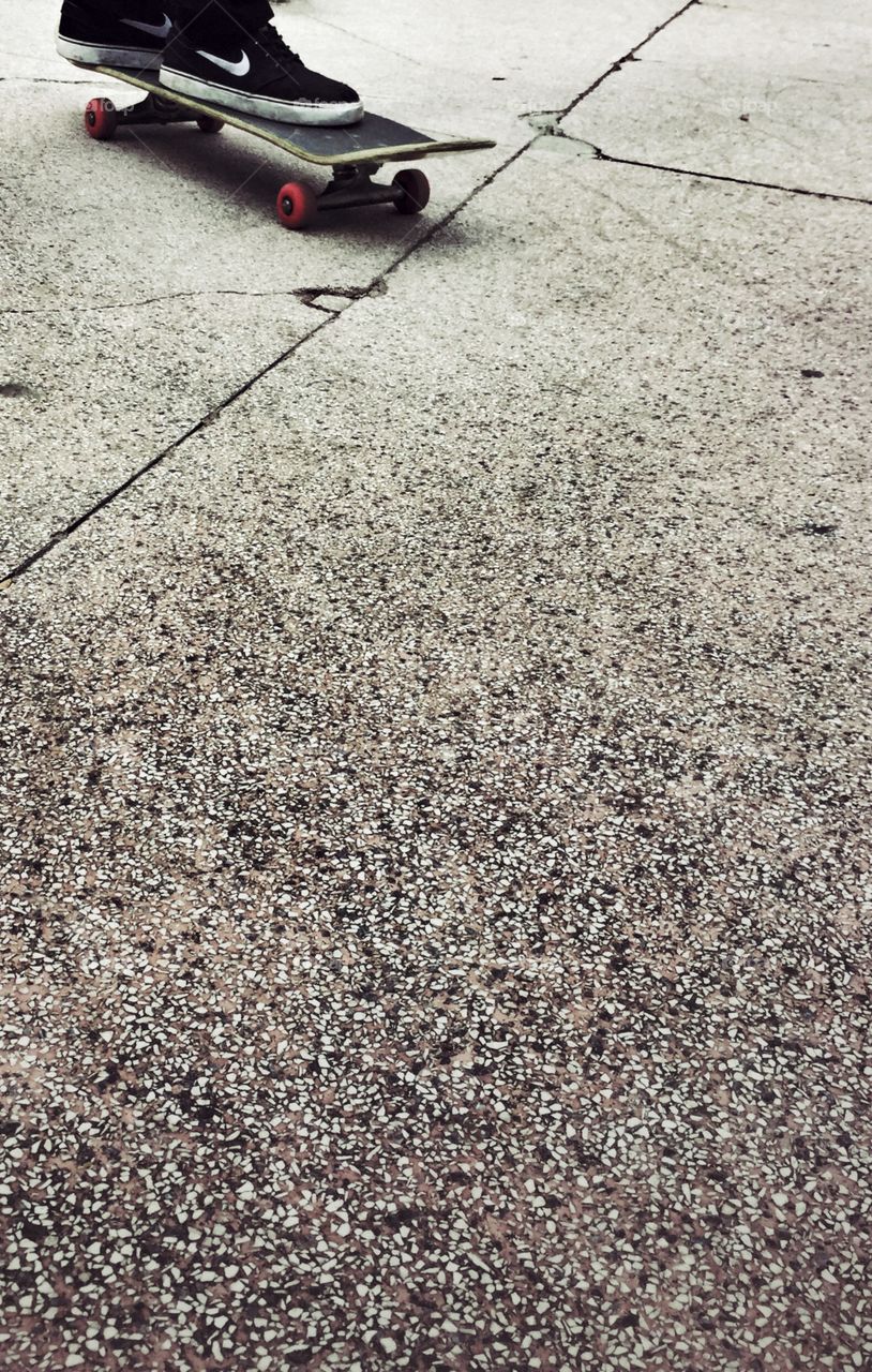 Boy feet skateboarding 