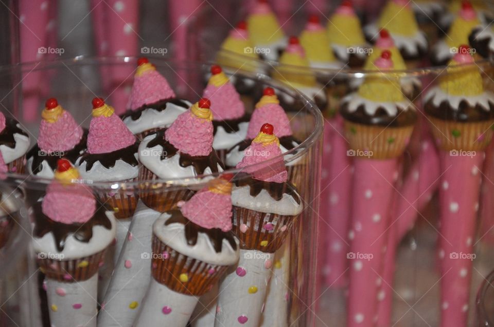 Pens with colorful muffins 