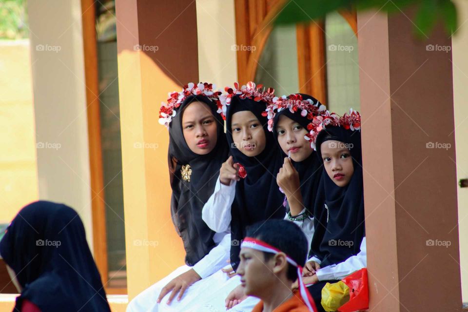 Jakarta, September 1,2019 - Indonesian children wearing hijabs. There are red and white ribbons on top of their hijabs.