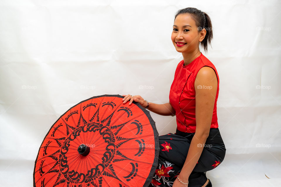 Beautiful lady with paper umbrella