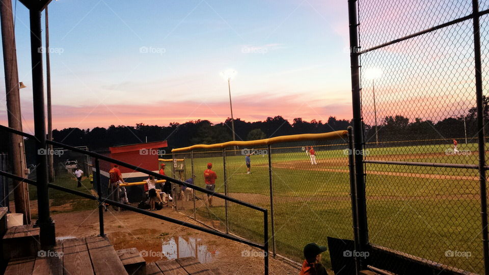 sunset at hometown field. last game of the year