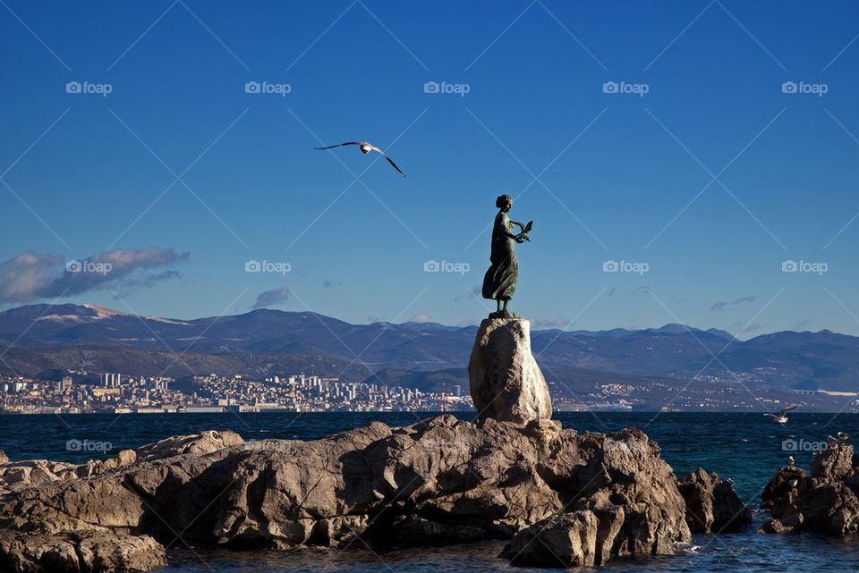 Maiden with the seagull statue in Opatija, Croatia