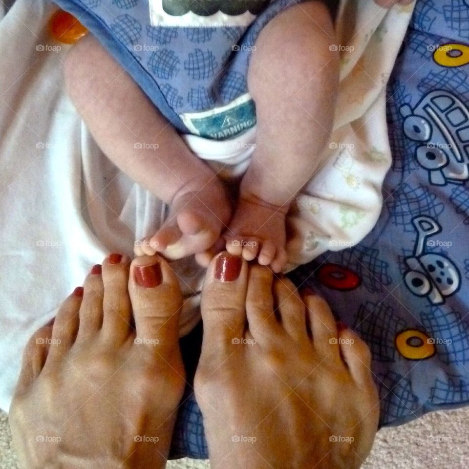 Old and new. Tiny feet and all grown up feet. 