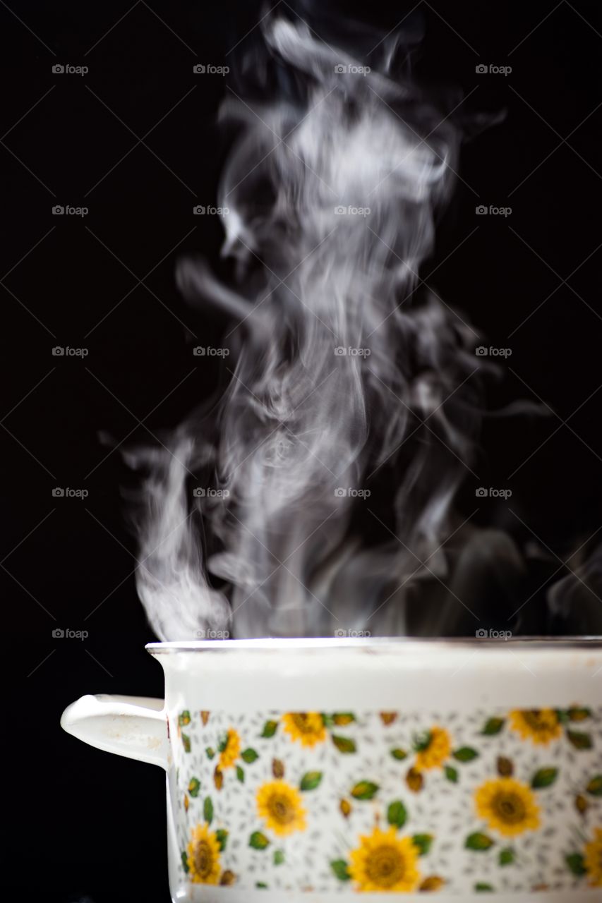 Steam rising out of saucepan