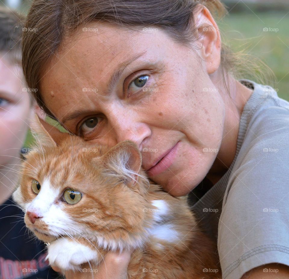 woman with cat beautiful portraits close up, natural beauty woman