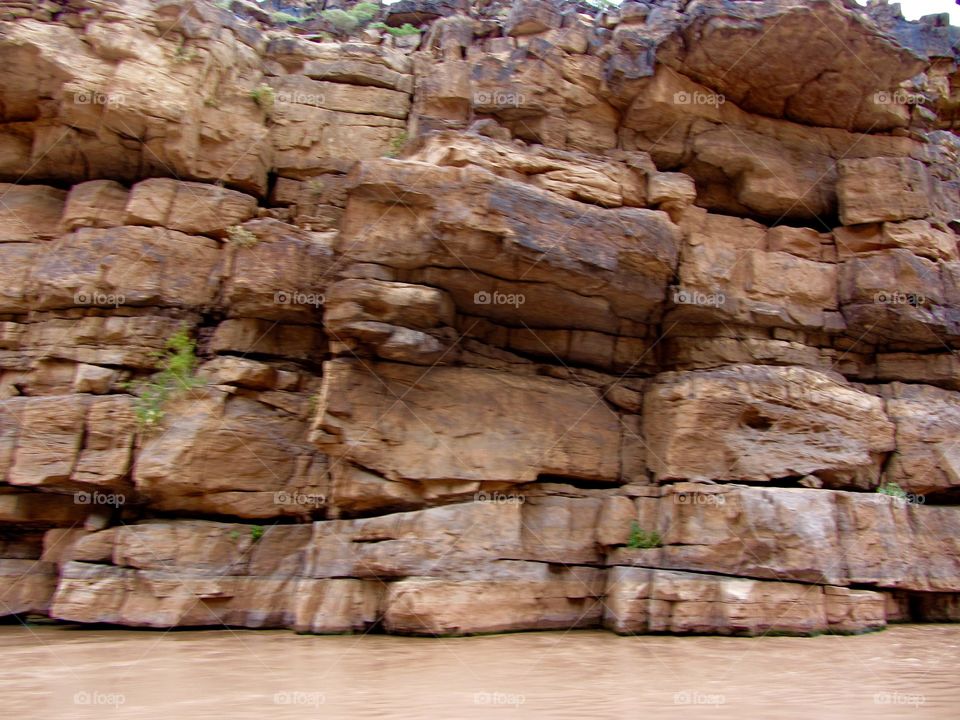 A view of the beautiful rock formations of the Grand Canyon while cruising the Colorado River.