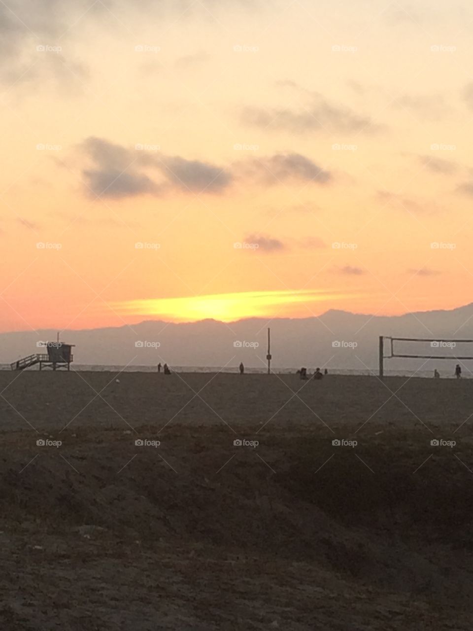 “After Glow” is the clouds catching the last direct sun rays just after the sun goes behind the mountains.