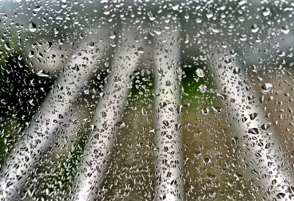 Rain viewed behind window