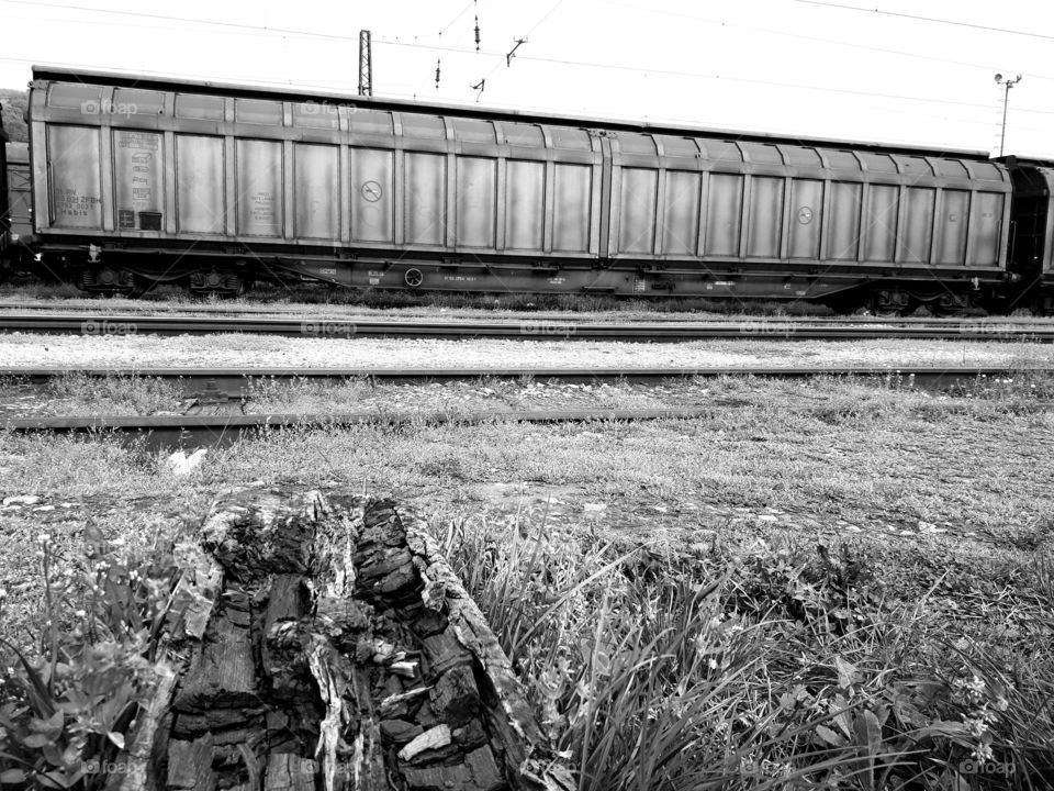 the old worn-out railroad next to the track at the cargo station