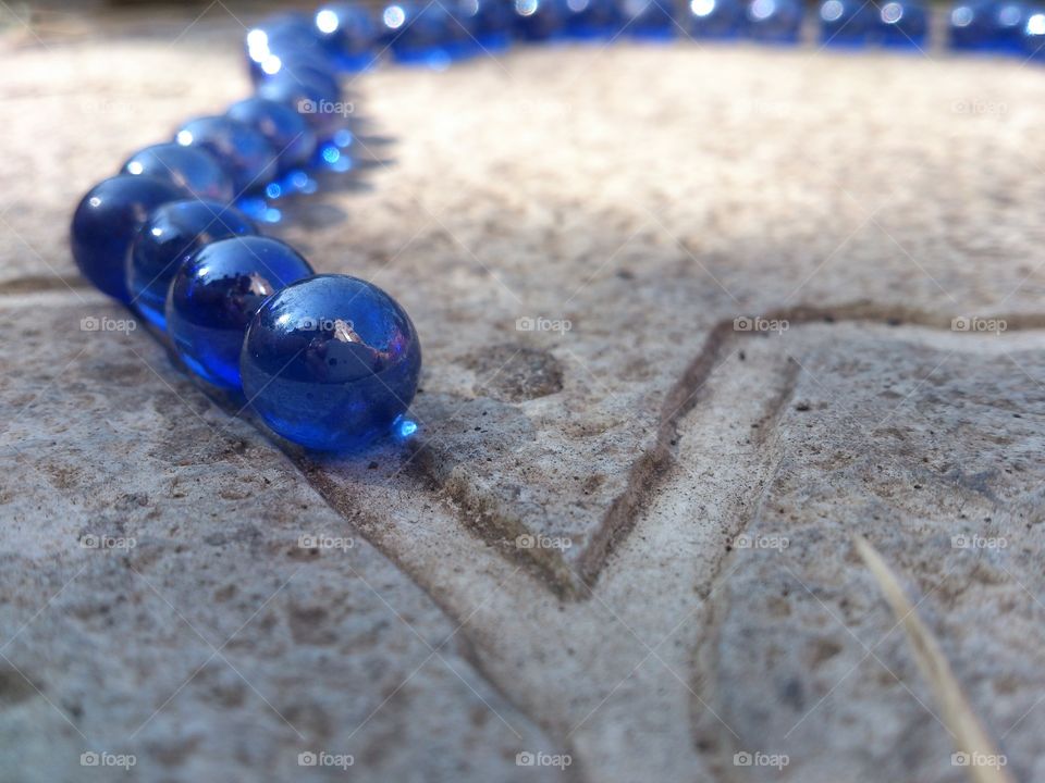 blue beads on the floor