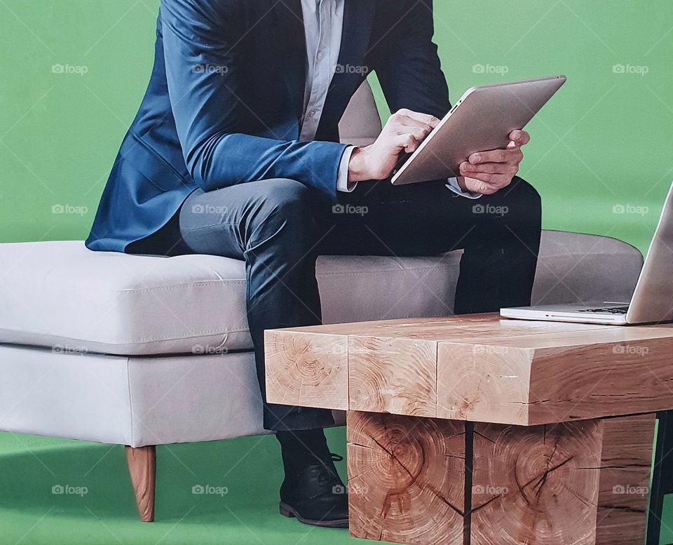 Business man with a tablet in his hands