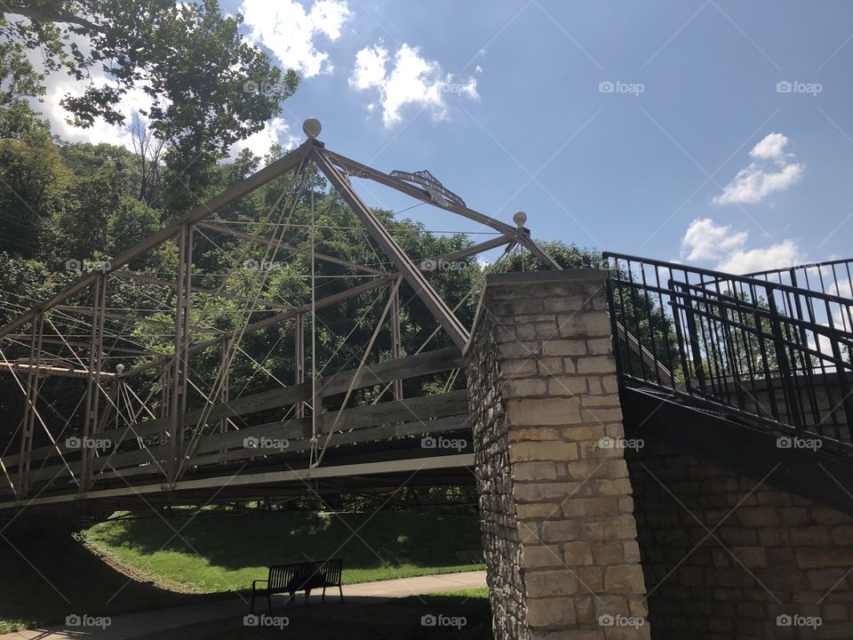 A Bridge Over A Park Bench
