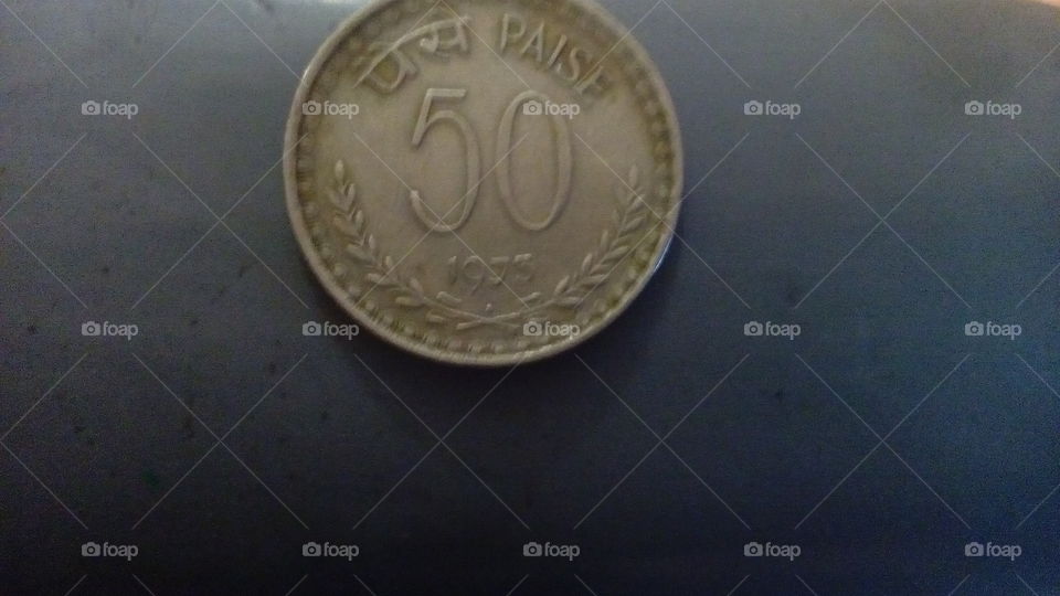 Close-up of a fifty paise coin