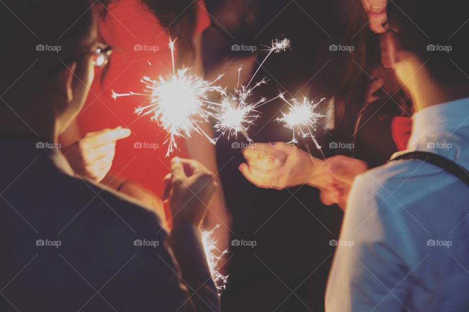Celebrating with sparklers and friends