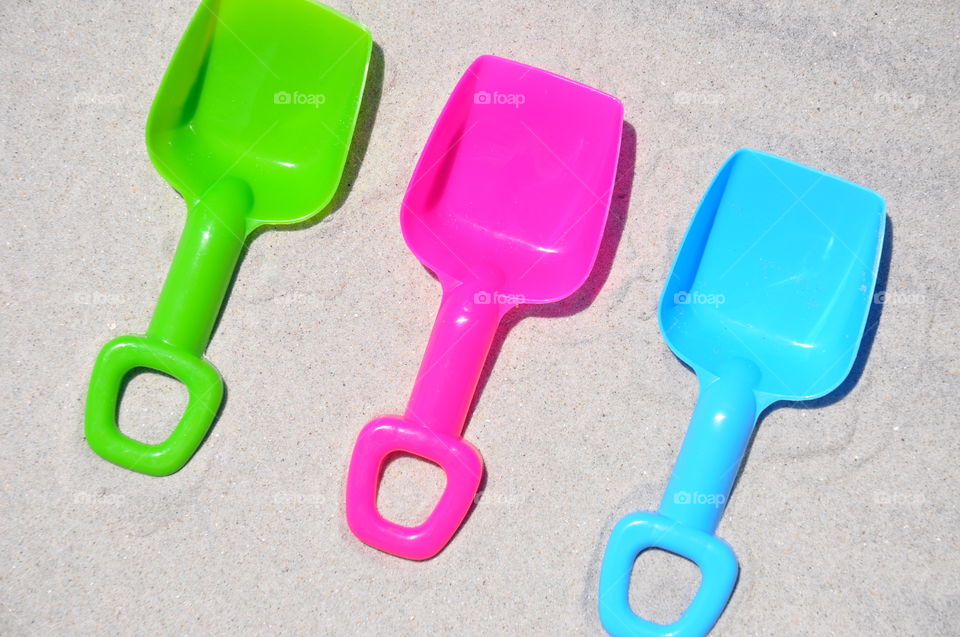 Toy beach shovels. 