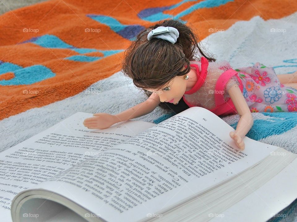 barby reading on the beach