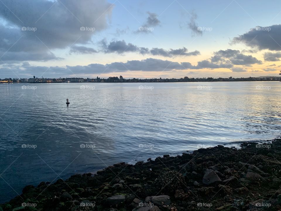 View of the harbor and island at subset. 