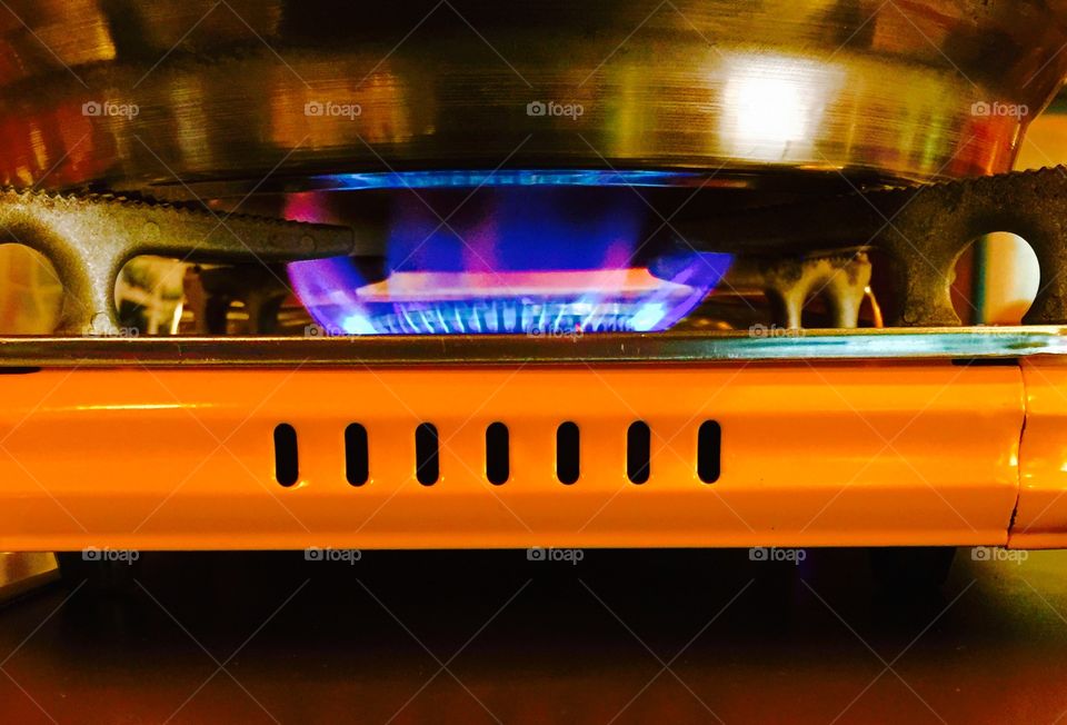 Blue Singe . Yakiniku grill with a blue flame closeup 