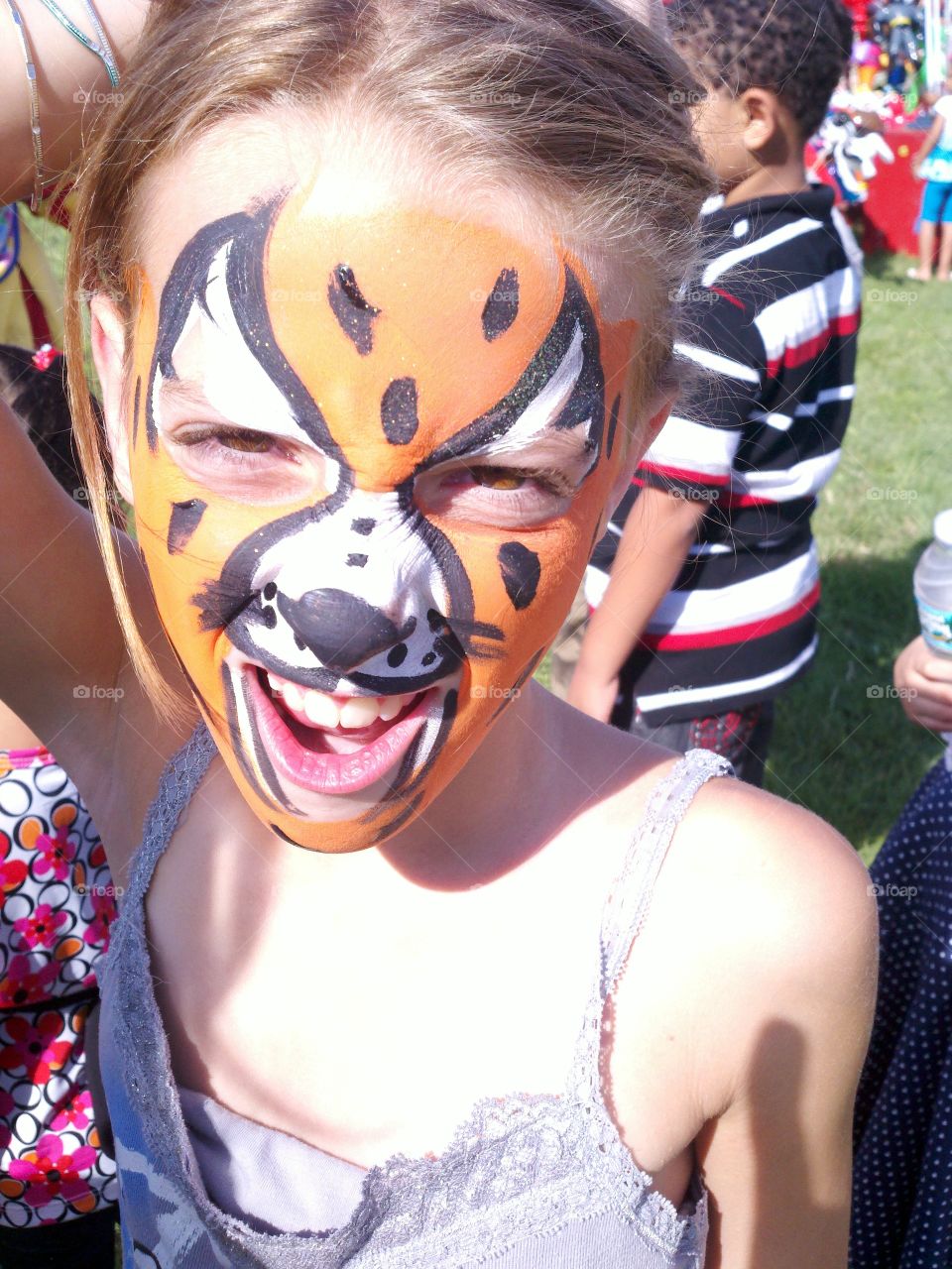 Close-up of a girl with painted face
