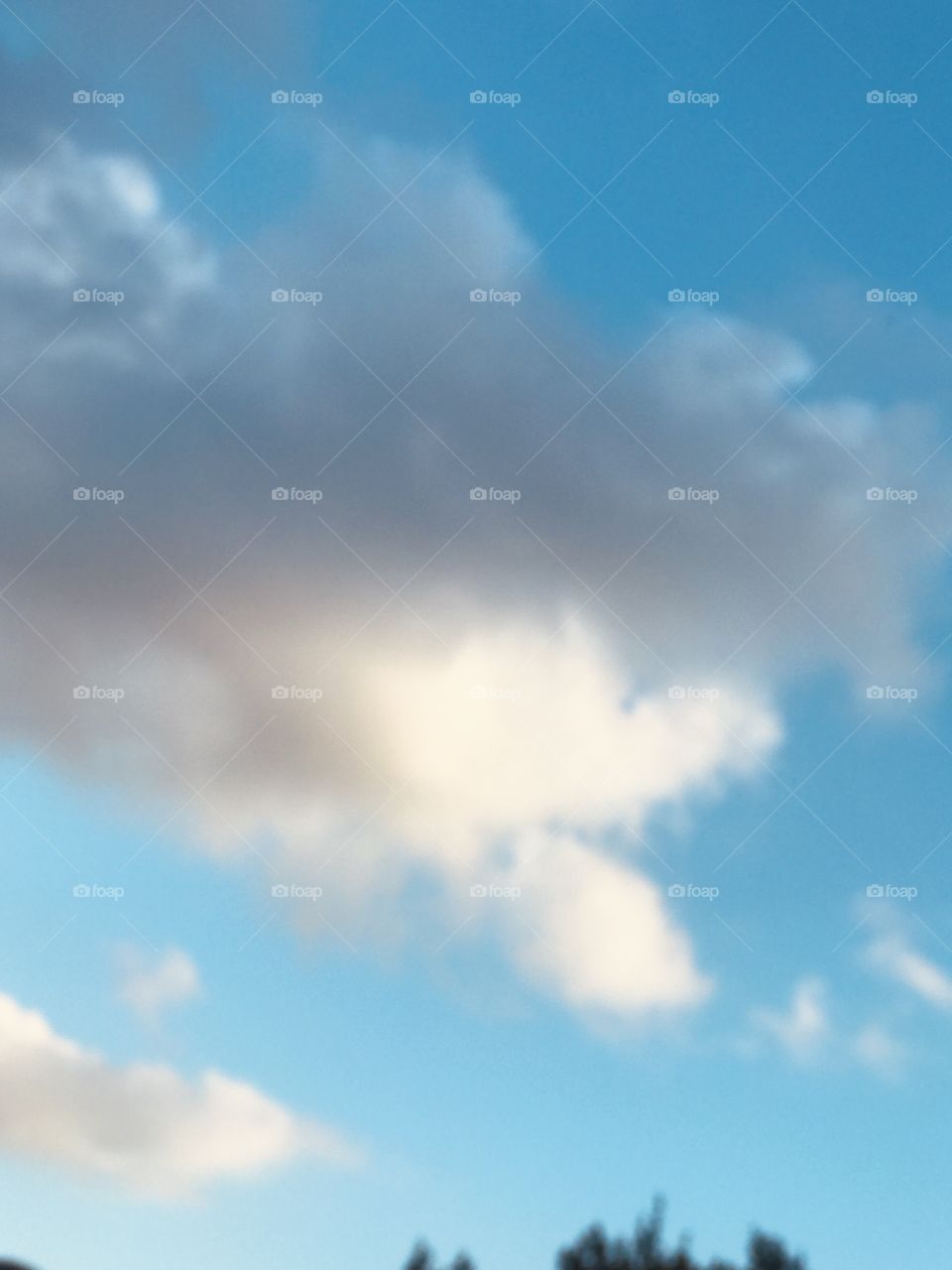 Beautiful white cloud with a rain cloud in front