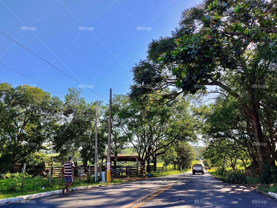 The back roads in the interior of Brazil are beautiful, with unique landscapes, including the rural lifestyle that mixes with the city life.