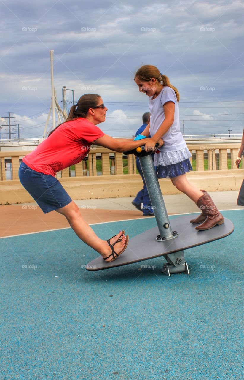 Lean into it. Mom and daughter playing