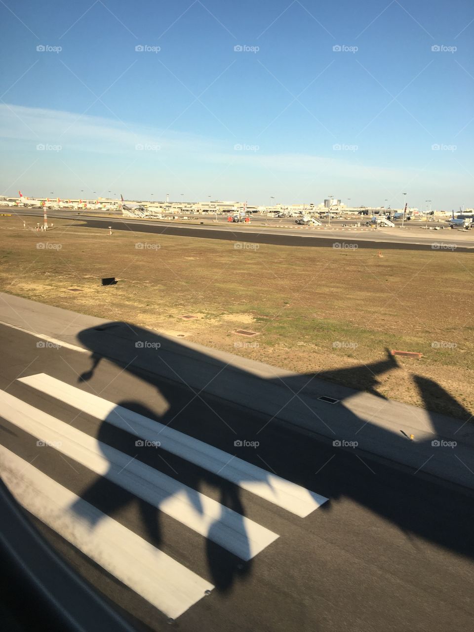 Plane’s shadow just before landing