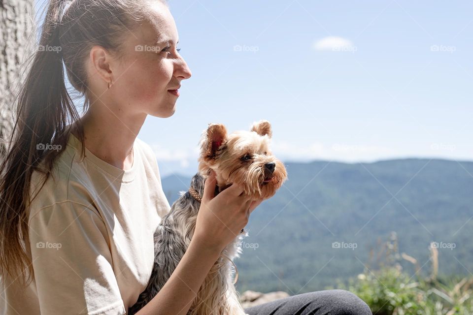 woman travel with her dog