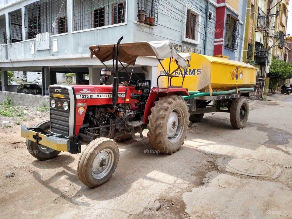 a tractor with a water tank