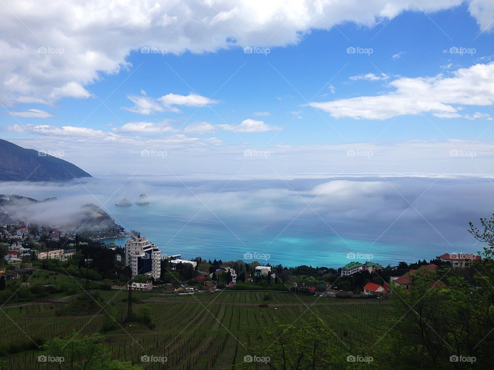 Enjoying the last summer days watching hard fog above the sea 