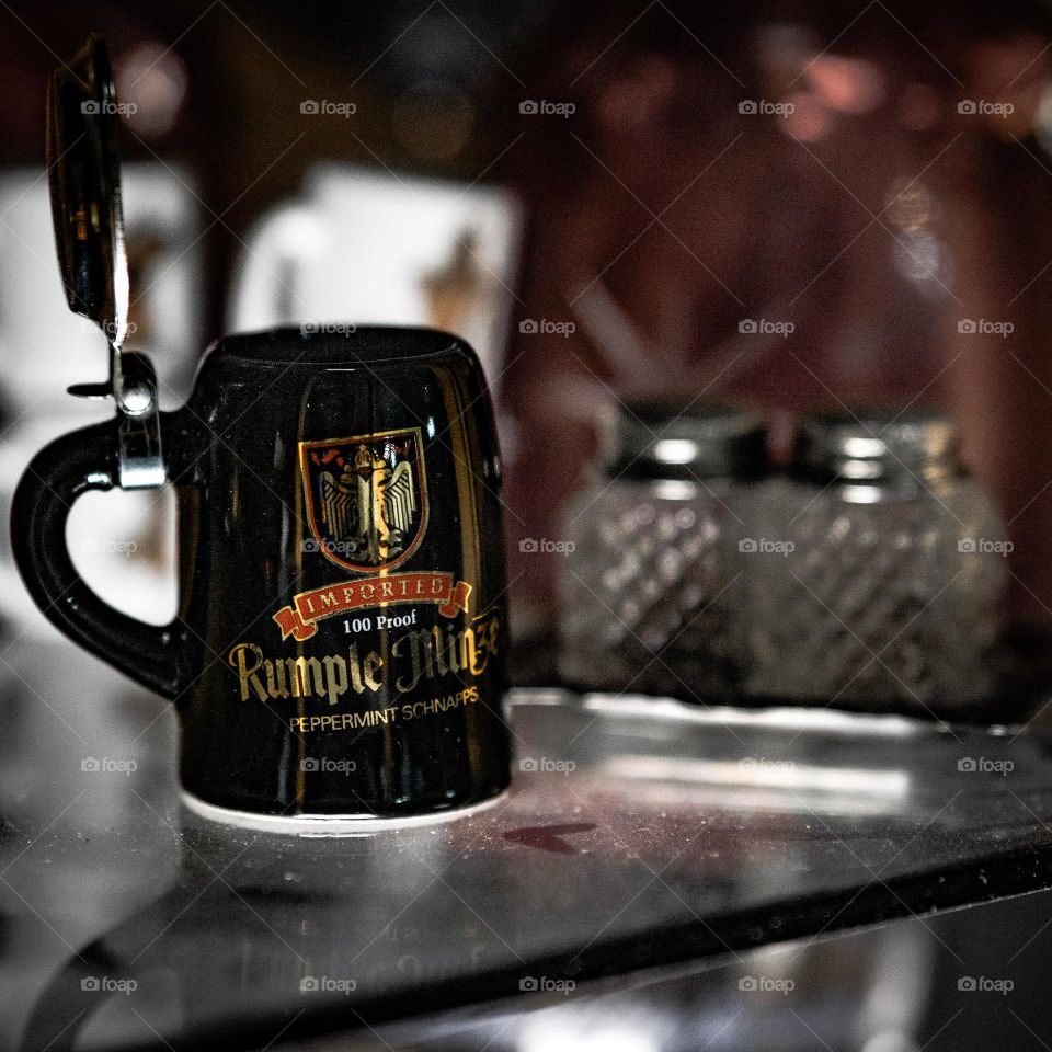 Jaeger shooter on the glass shelf.