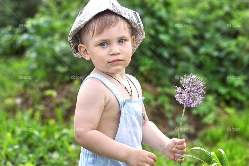 boy with a flower