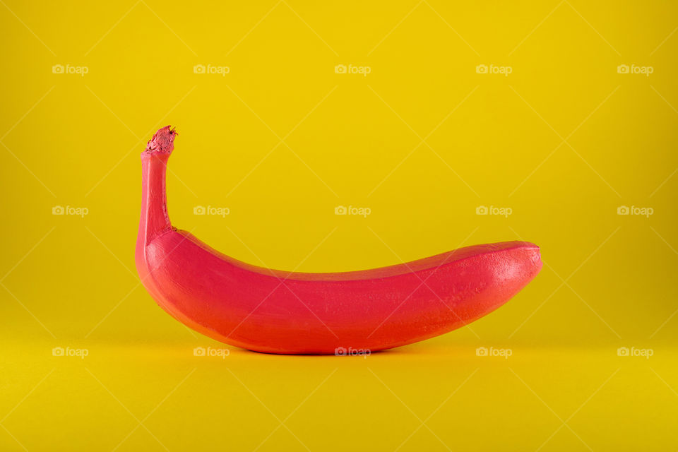pink banana.  minimal food concept