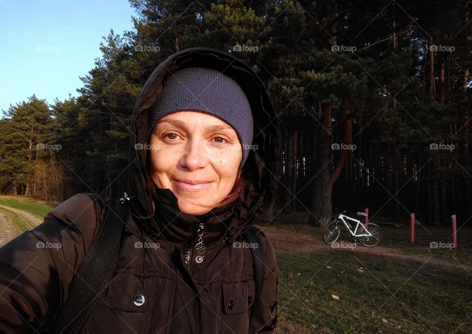 selfie girl walk on the nature green field