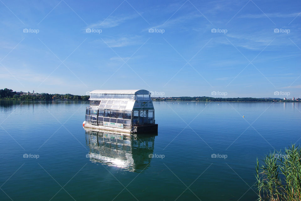 Enigma cruise ship - Pusiano lake in Pusiano, Como, Italy.