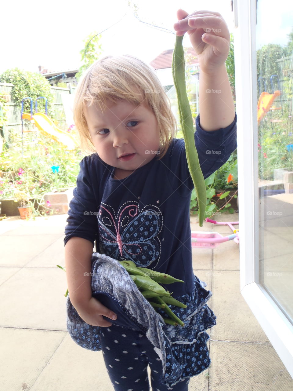 Girl looking at beans