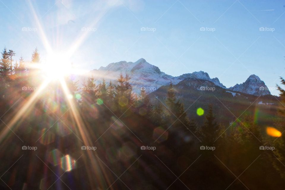 Sunlight streaming in the alps 