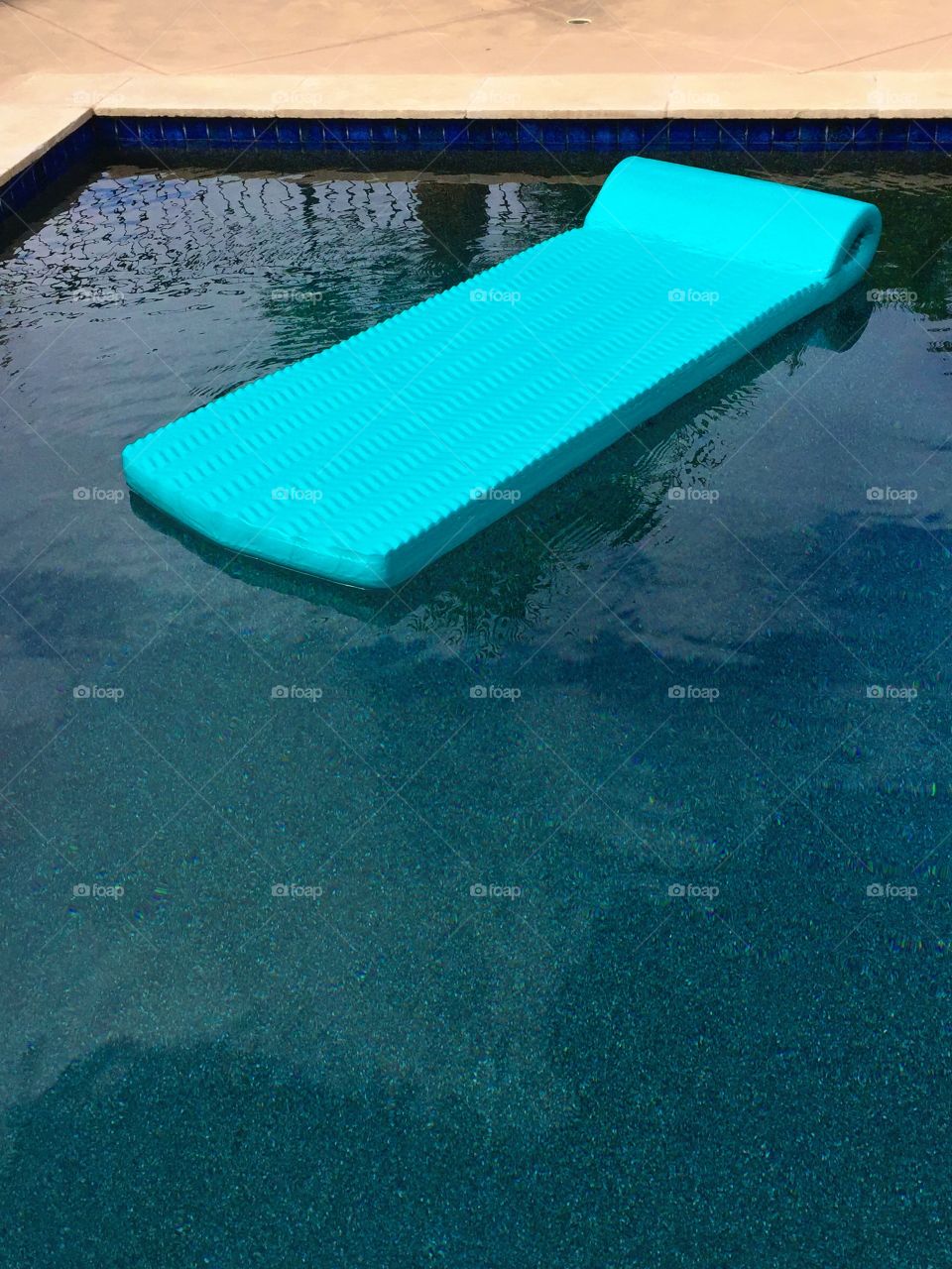 Pool Float in Swimming Pool . Empty pool waiting for people to swim