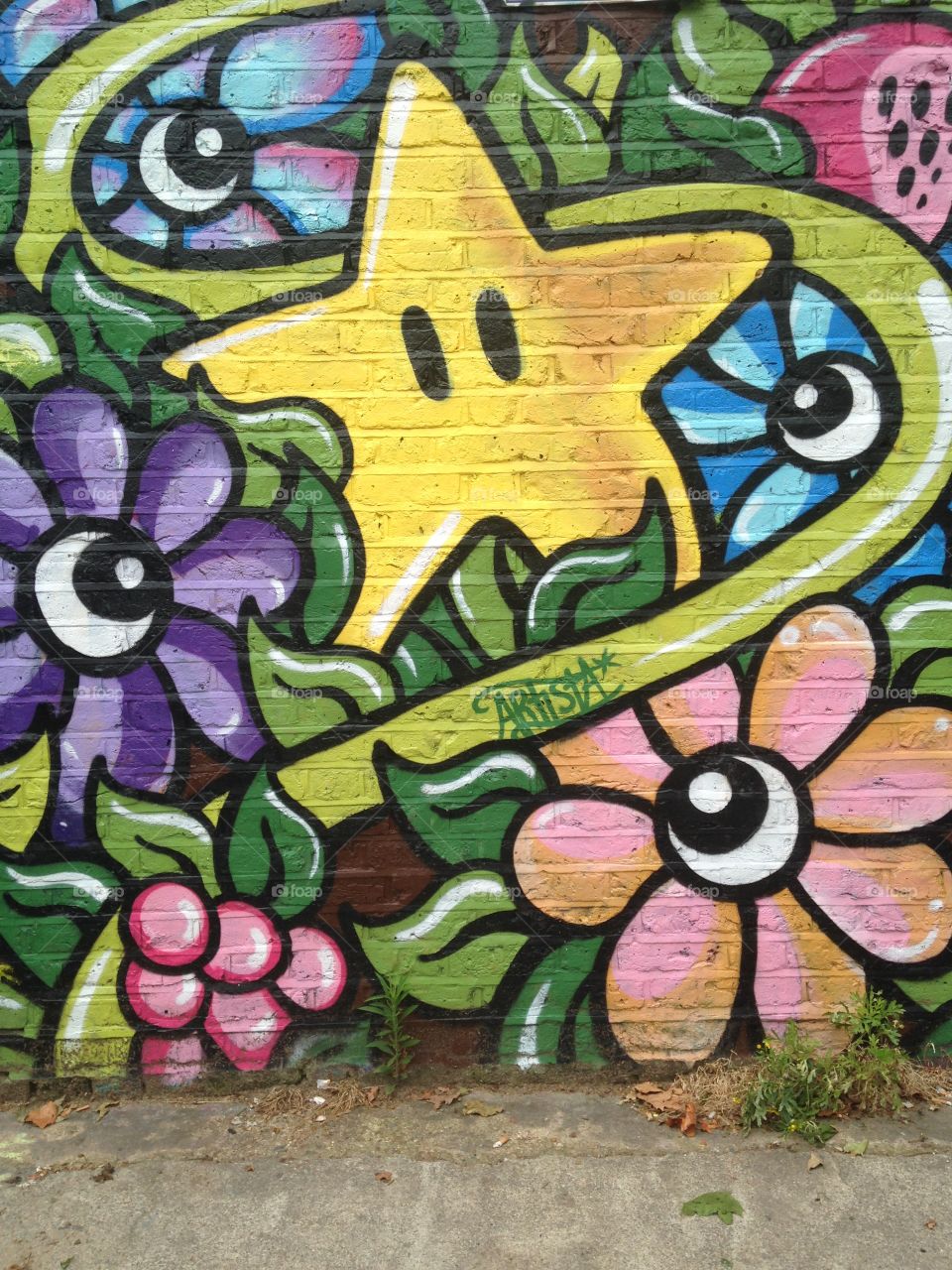 Checking out street art in Brick Lane