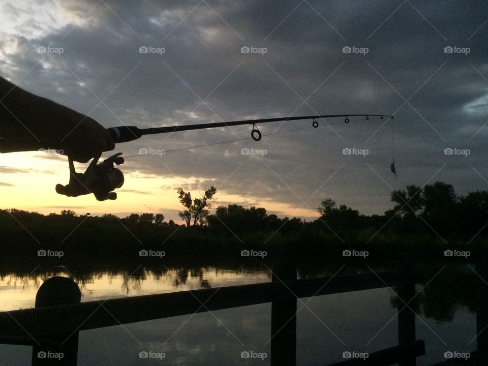 Relaxing fishing from the dock 