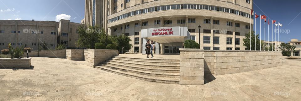 A pano from me and mom standing in front of my medicine faculty 