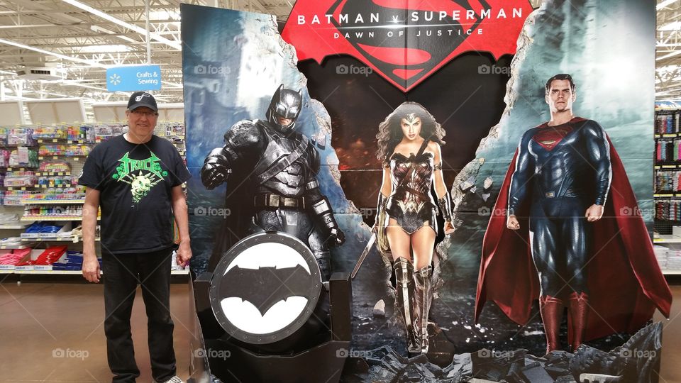 Batman vs Superman display with fan