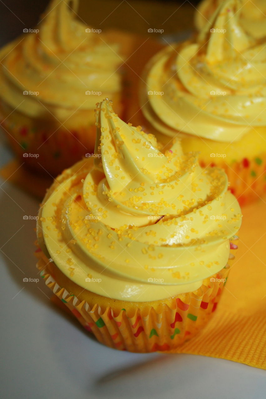 Yellow Sweetness . Yellow cupcake with buttercream icing 