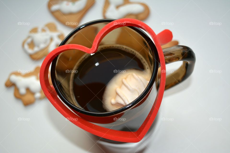 High angle view of heart shape on coffee cup