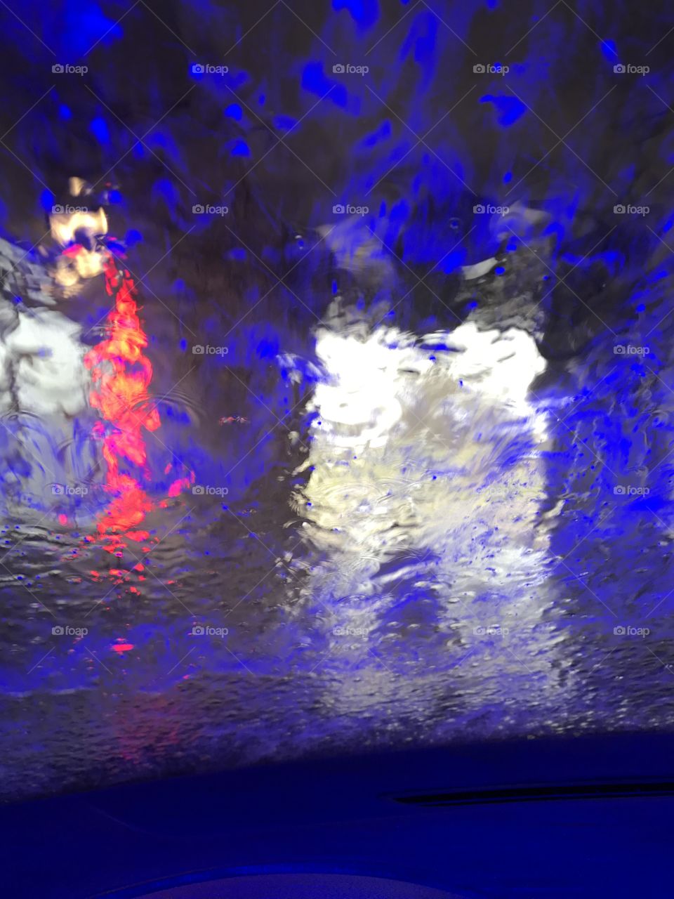 Red and Blue lights at car wash